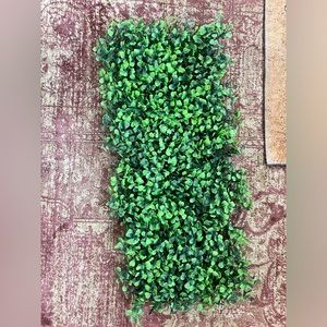 Green faux plant wall